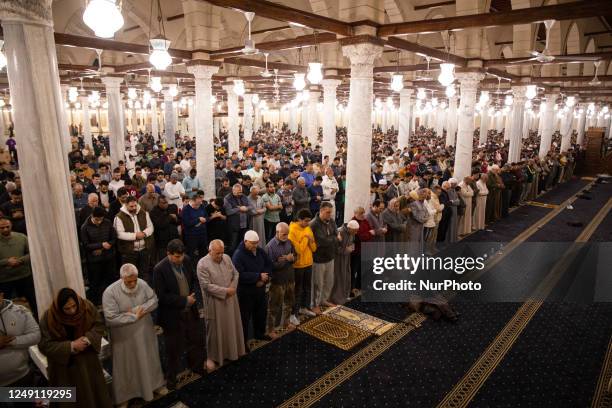 Muslims perform the first 'Tarawih' prayer on the beginning of the Islamic Holy month of Ramadan at the Amr bin As Mosque in Cairo, Egypt on March...