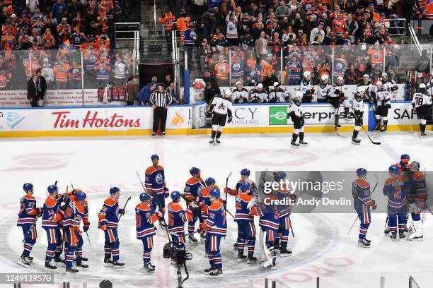 The Edmonton Oilers celebrate after their overtime victory over the Arizona Coyotes on March 22, 2023 at Rogers Place in Edmonton, Alberta, Canada.