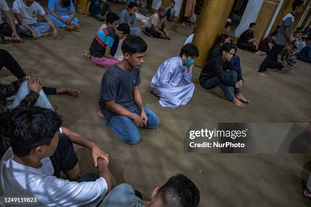 Filipino Muslims sit inside a mosque as they pray during the holy fasting month of Ramadan in Manila, Philippines, on march 22, 2023.Ramadan is a...