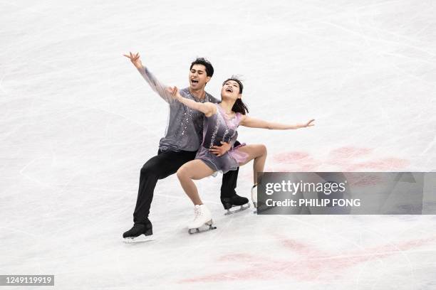 S Emily Chan and Spencer Akira Howe perform during the pairs free skating event at the ISU World Figure Skating Championships in Saitama on March 23,...