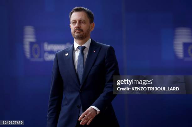 Slovakia's Prime Minister Eduard Heger arrives for a EU Summit, at the EU headquarters in Brussels, on March 23, 2023. - The two-day summit of the 27...