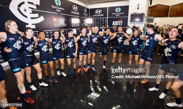 The Blues sing the team song during the 2023 AFL Round 02 match between the Carlton Blues and the Geelong Cats at the Melbourne Cricket Ground on...