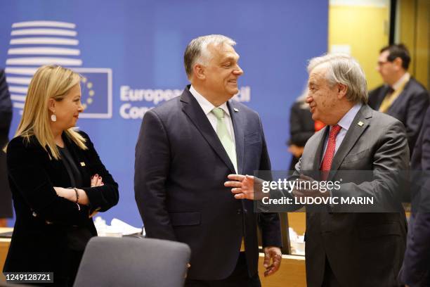 Secretary-General António Guterres talks with Hungary's Prime Minister Viktor Orban and Italy's Prime Minister Giorgia Meloni as they attend a EU...