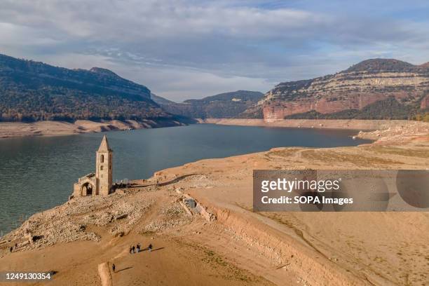 Aerial view of the almost completely dried up Sau Reservoir. The 11th-century church, which was once underwater, has resurfaced after a months-long...