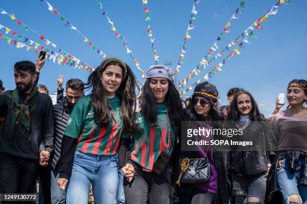 Girls wearing Amedspor jerseys are seen playing games and singing songs during the celebration. At the call of the Peoples' Democratic Party ,...