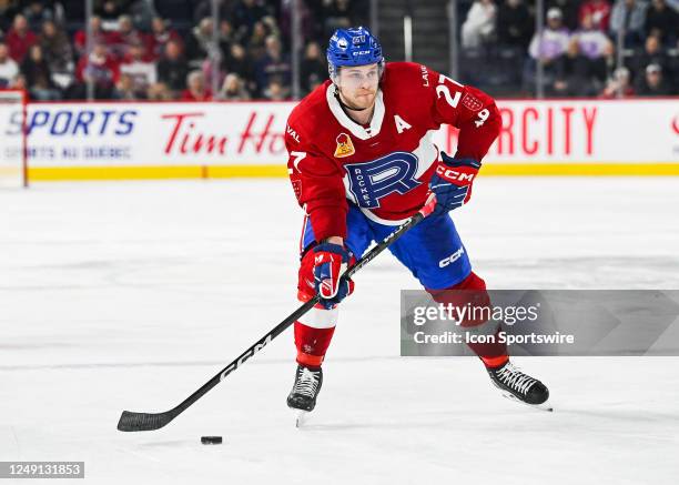 Laval Rocket center Mitchell Stephens plays the puck during the Bridgeport Islanders versus the Laval Rocket game on March 22 at Place Bell in Laval,...