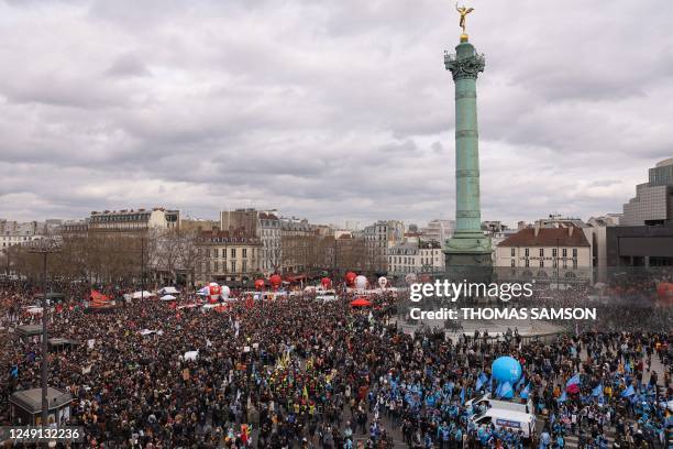 Protestors gather on place de la Bastille to attend a demonstration a week after the government pushed a pensions reform through parliament without a...