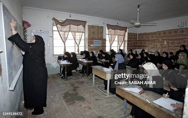 School Time In Iraq 279 Enrolling In A School Stock Photos, High-Res Pictures, and Images ...
