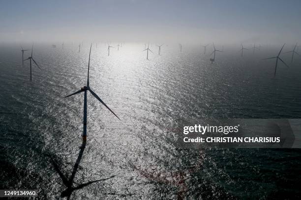Wind turbines are pictured during the installation of the RWE Offshore Wind farm Kaskasi off the coast of the north German Island of Helgoland on...