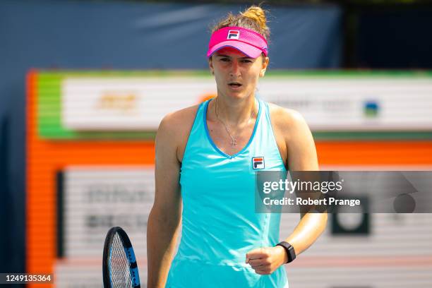 Irina-Camelia Begu of Romania reacts against Qinwen Zheng of China in her second-round match match on Day 5 of the Miami Open at Hard Rock Stadium on...