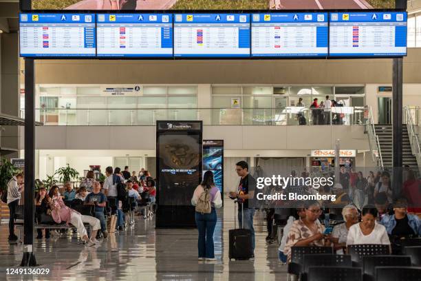 Travelers at the Alfonso Bonilla Aragon International Airport in Cali, Colombia, on Thursday, March 23, 2023. Colombias Civil aviation authority...