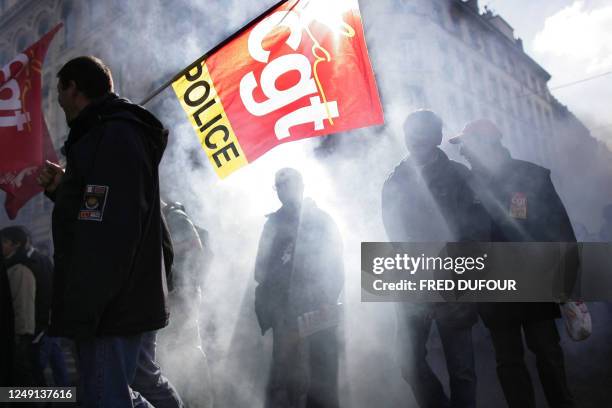 French public workers demonstrate, 18 October 2007 in Lyon, during a 24-hour strike against the government's reform plans of historic pensions...