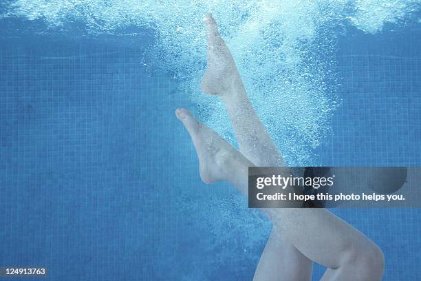 girl swimming in pool with nice legs - women with nice legs bildbanksfoton och bilder