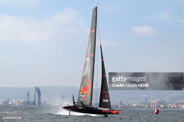 Alinghi Red Bull Racing's AC75 racing yatch sails during a training session ahead of the 37th America's Cup sailing race, off the coast of Barcelona...