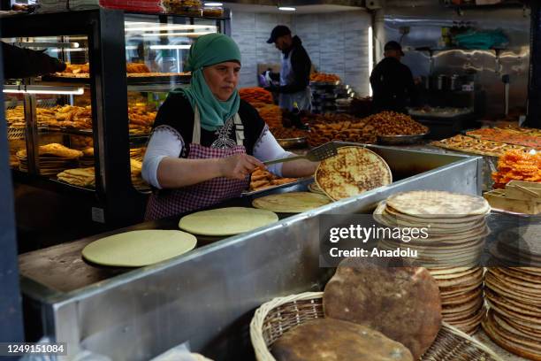 People do shopping during holy month of Ramadan in Paris, France on March 23, 2023.