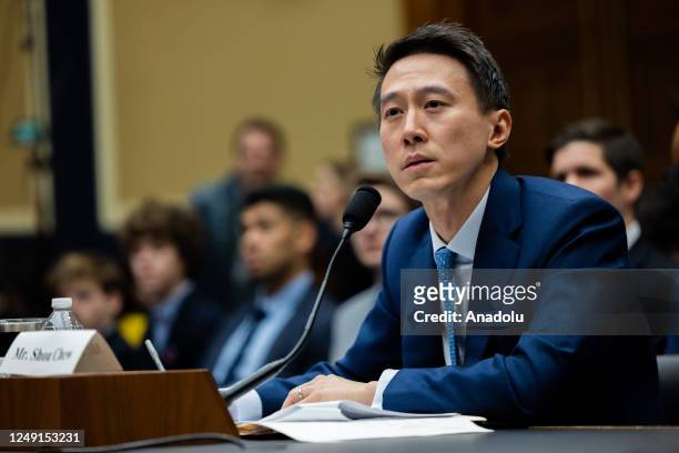 TikTok CEO Shou Zi Chew listens to questions from U.S. Representatives during his testimony at a Congressional hearing on TikTok in Washington, DC on...