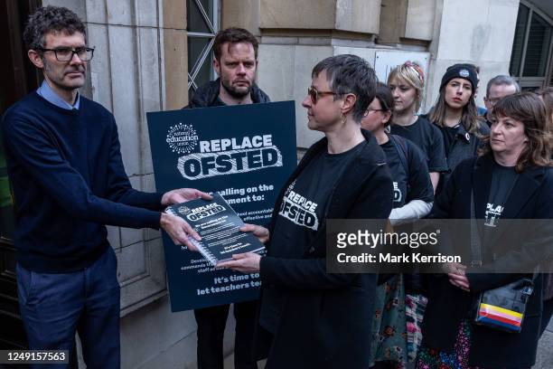 Teachers hand in a petition at the Department for Education calling for urgent reform of the school inspection system and the replacement of Ofsted...