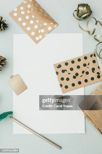 empty sheet , envelopes, scissors top view.feminine desktop - flat lay photos et images de collection