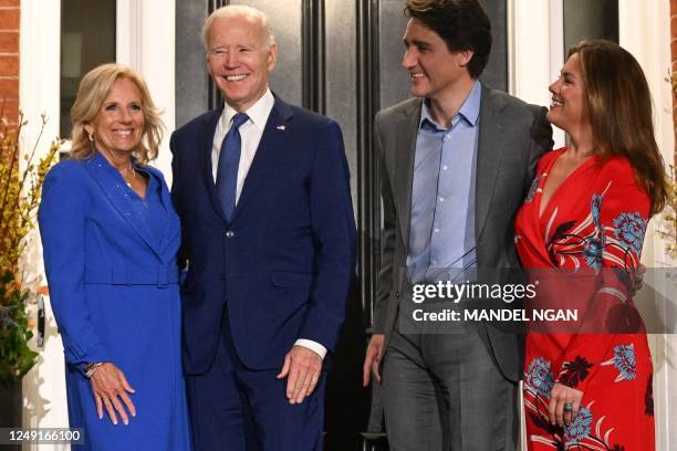 Canadian Prime Minister Justin Trudeau and his wife Sophie Grégoire Trudeau greet US President Joe Biden and First Lady Jill Biden as they arrive at...