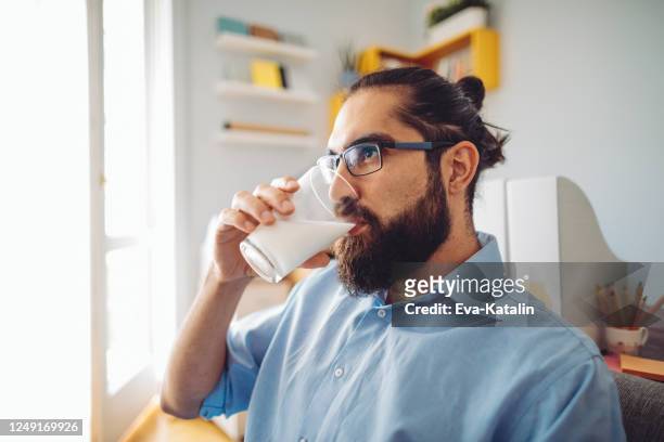 95 Hispanic Man Drinking Milk Photos and Premium High Res Pictures - Getty  Images
