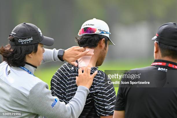Hideki Matsuyama receives attention from his physio team before Rd2 of the WGC Dell Technologies Match Play at Austin Country Club on March 23, 2023...