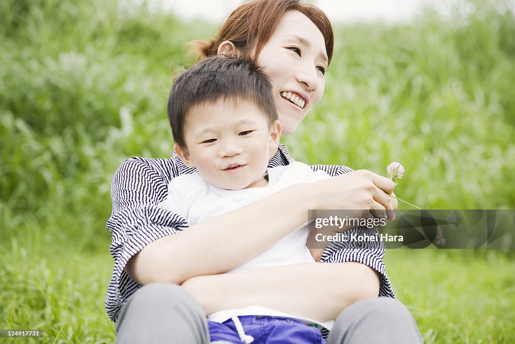 Mother and boy playing at park