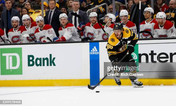 David Pastrnak of the Boston Bruins skates against the Montreal Canadiens during the third period at the TD Garden on March 23, 2023 in Boston,...