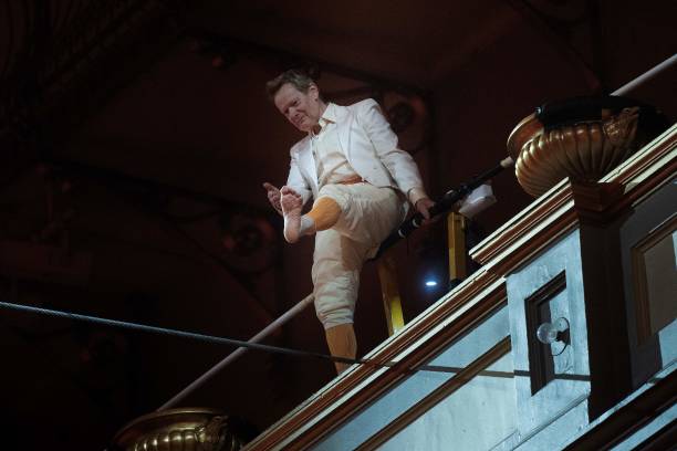 DC: High Wire Artist Philippe Petit Performs At The National Building Museum In Washington, DC