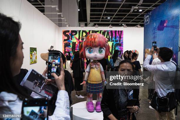 Attendees view an artwork by Mr. At the Kaikai Kiki Gallery booth during Art Basel in Hong Kong, China, on Thursday, March 23, 2023. Art Basel...