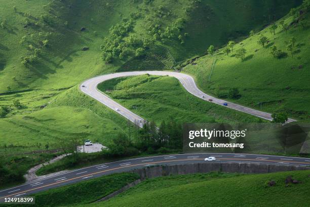 yufuin - hairpin curve stock pictures, royalty-free photos & images