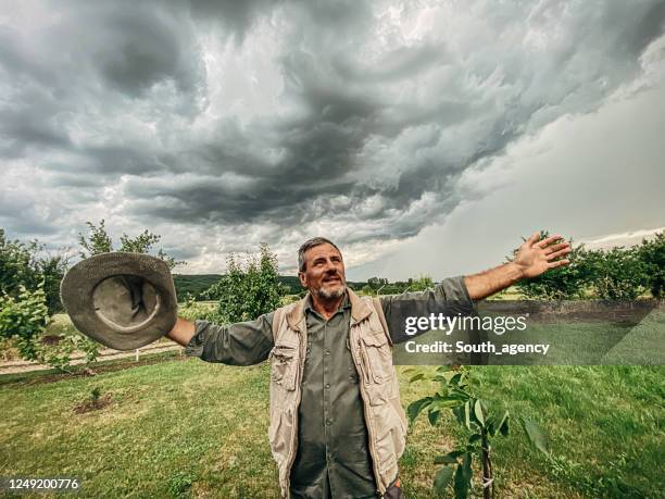 Farmers While Raining Farmer Rain Photos and Premium High Res Pictures - Getty Images