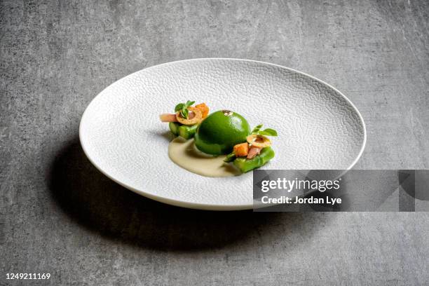 green color poached egg - snack stock pictures, royalty-free photos & images