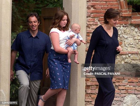 British Prime Minister Tony Blair and his wife Cherie leave 20 August