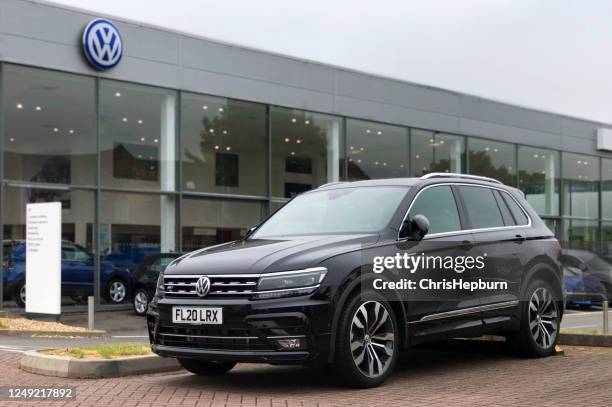 volkswagen tiguan r-line at dealership - volkswagen stock pictures, royalty-free photos & images