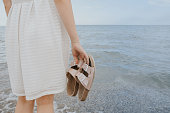 woman with beach slippers