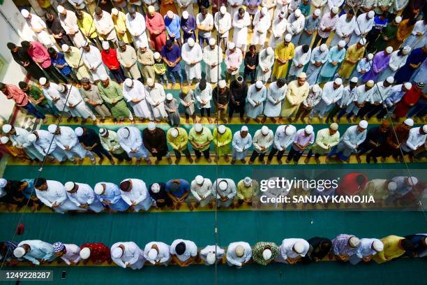 Muslim devotees offer first Friday prayers of the holy fasting month of Ramadan at the Vasi Ullah mosque in Prayagraj on March 24, 2023.