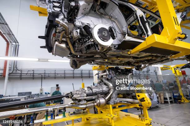 The engine to chassis marriage area for an Aston Martin DBX sport utility vehicle on the final assembly line at the Aston Martin Lagonda Global...