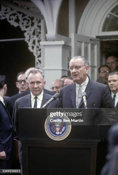 President Lyndon Johnson and Aleksej Nikolaevič Kosygin speaking at the podium at Glassboro Summit, Glassboro, NJ, June 1967.