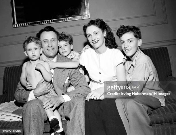 American politician, entertainer, businessman, and U.S. Senator from Idaho Glen H. Taylor , poses with his wife Doar Marie Pike Taylor and their sons...