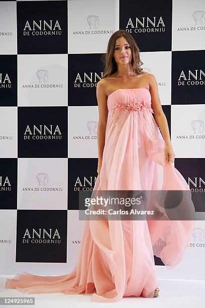 Model Malena Costa presents new Victorio & Lucchino dress for Anna Codorniu at Torre de Cristal Hotel on September 14, 2011 in Madrid, Spain.