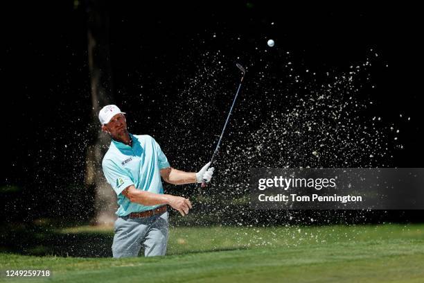 Vaughn Taylor of the United States plays a shot from a bunker on the eighth hole during the second round of the Charles Schwab Challenge on June 12,...