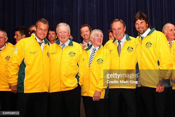 Former and current Australian tennis greats Lleyton Hewitt, Frank Sedgman, Ken Rosewall, John Newcombe and Pat Rafter appear on stage with other...