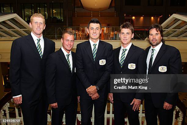 The Australian Davis Cup team poses during the official dinner ahead of the Davis Cup World Group Playoff Tie between Australia and Switzerland at...