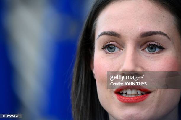 Finland's Prime Minister Sanna Marin talks to the press at the end of a EU Summit, at the EU headquarters in Brussels, on March 24, 2023.