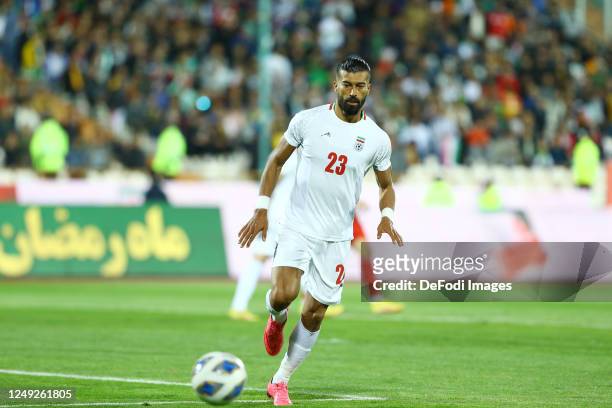 Ramin Rezaeian of Iran controls the ball during the International Friendly between Iran and Russia at Azadi Stadium on March 23, 2023 in Tehran, Iran.