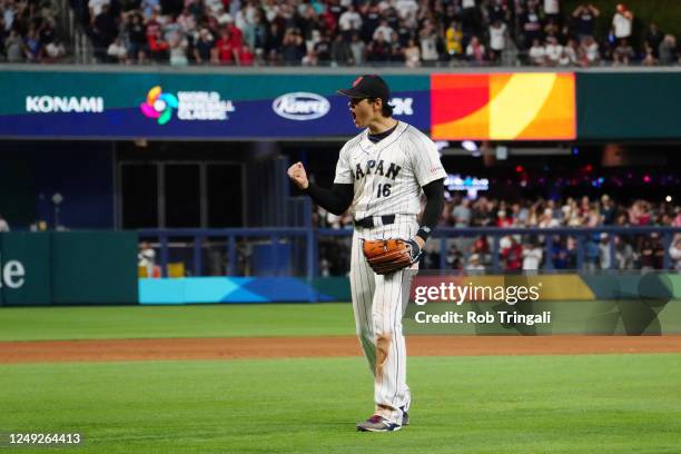 Shohei Ohtani of Team Japan reacts to striking out Mike Trout of Team USA to win the 2023 World Baseball Classic Championship game at loanDepot Park...