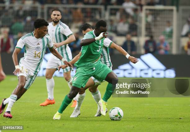 Hicham Boudaoui of Algeria fights for the ball, during the group F match between Algeria and Niger during the 2023 Africa Cup of Nations qualifiers...