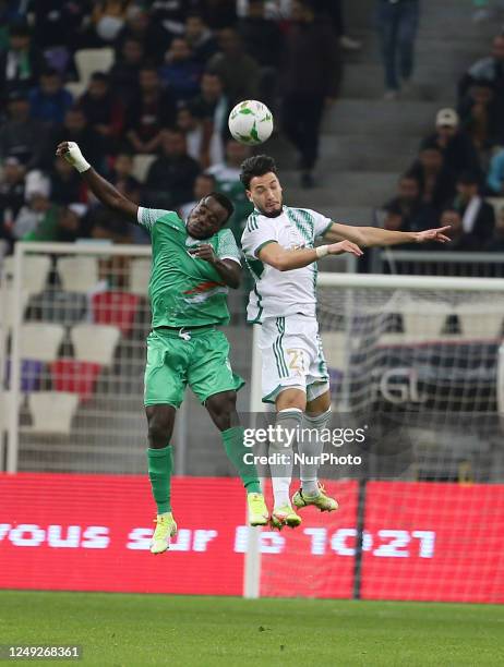 Rami Bensebaini of Algeria fights for the ball, during the group F match between Algeria and Niger during the 2023 Africa Cup of Nations qualifiers...