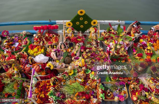 Idols of Goddess Gauri or Parvati to immerse in the Brahmaputra river as a tradition during traditional Gangaur festival on March 24, 2023 in...