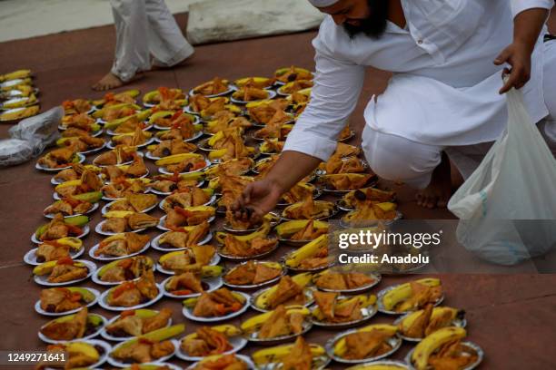 Muslims in India have the first fast-breaking evening meal of Ramadan, at Jama Mosque in New Delhi on March 24, 2023.